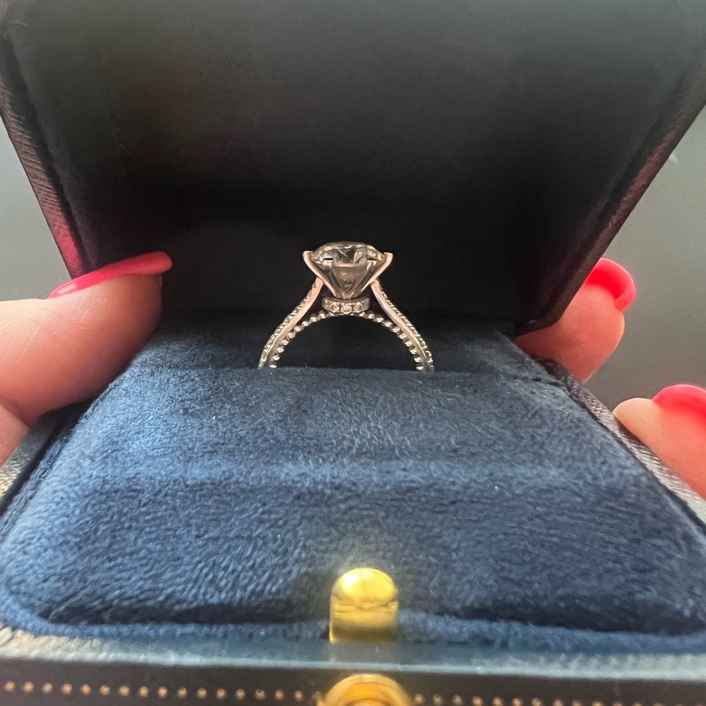 2ct GHI round moissanite solitaire in 10k white gold